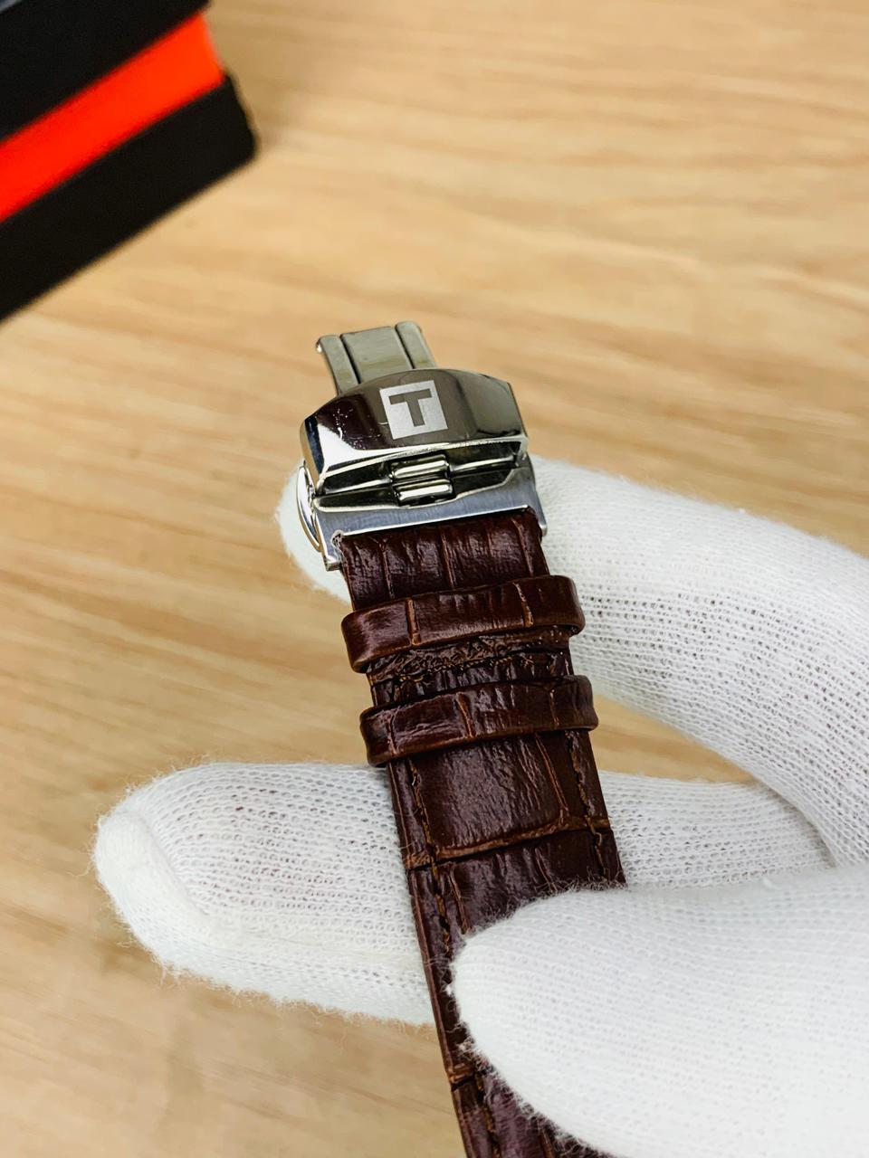 Chronograph Watch with Textured Leather Strap and Multifunction Dial